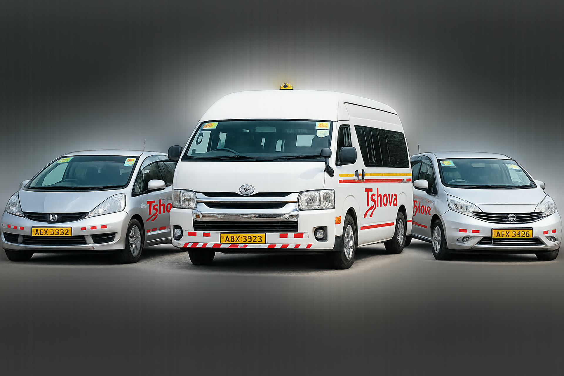 The Tshova fleet — a branded Toyota HiAce, Honda Fit and Nissan Note